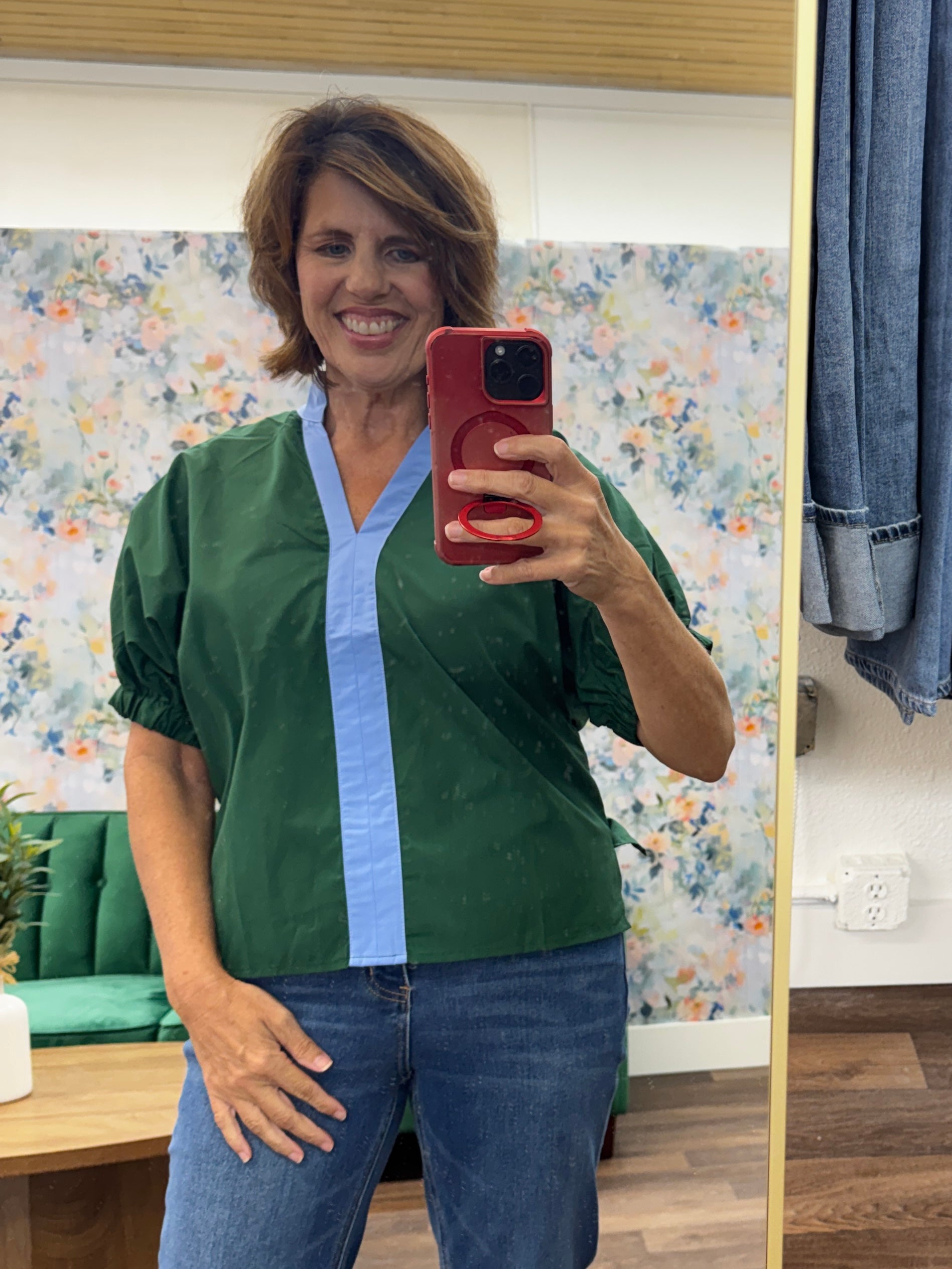 Green blouse with blue accent