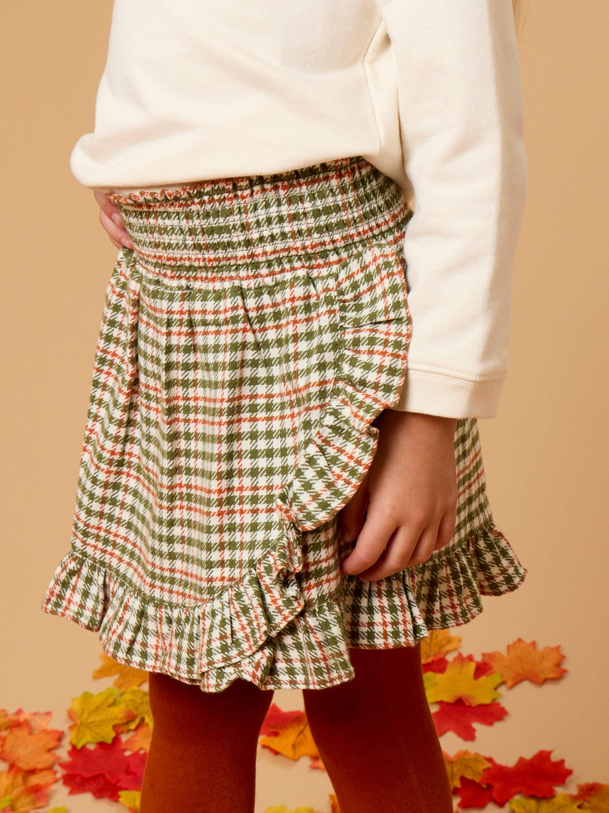 RuffleButts Girls Classic Houndstooth Smocked Ruffle Skort