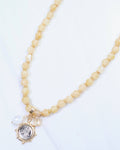 Trento Beaded Coin Charm Necklace Natural: Default