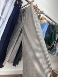 Black and white striped pants