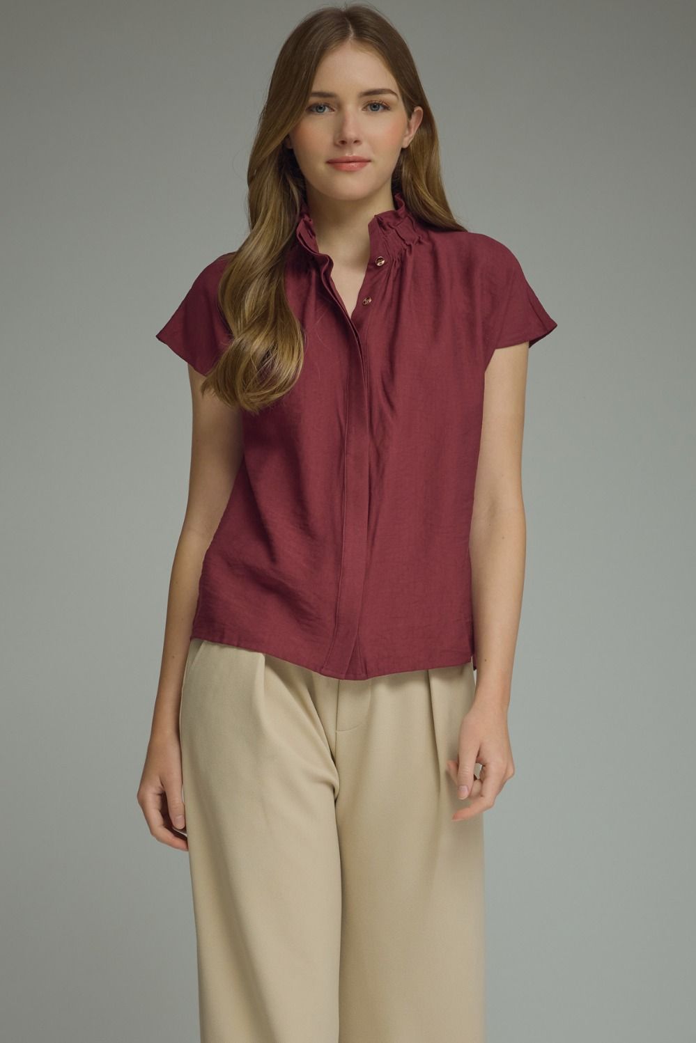 Burgundy cap sleeve top with ruffled split neckline