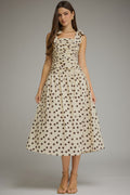Polka dot sleeveless midi dress