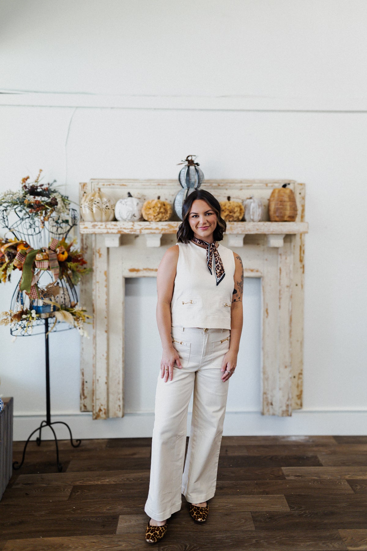 Ivory Sleeveless Top with Gold Hardware