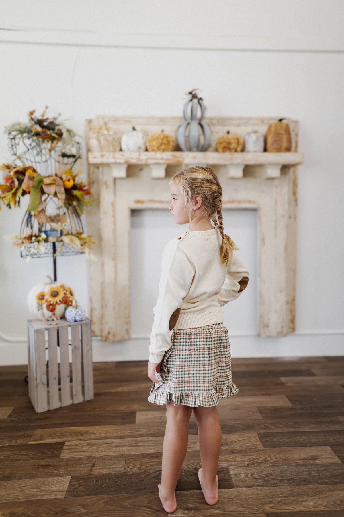 RuffleButts Girls Classic Houndstooth Smocked Ruffle Skort